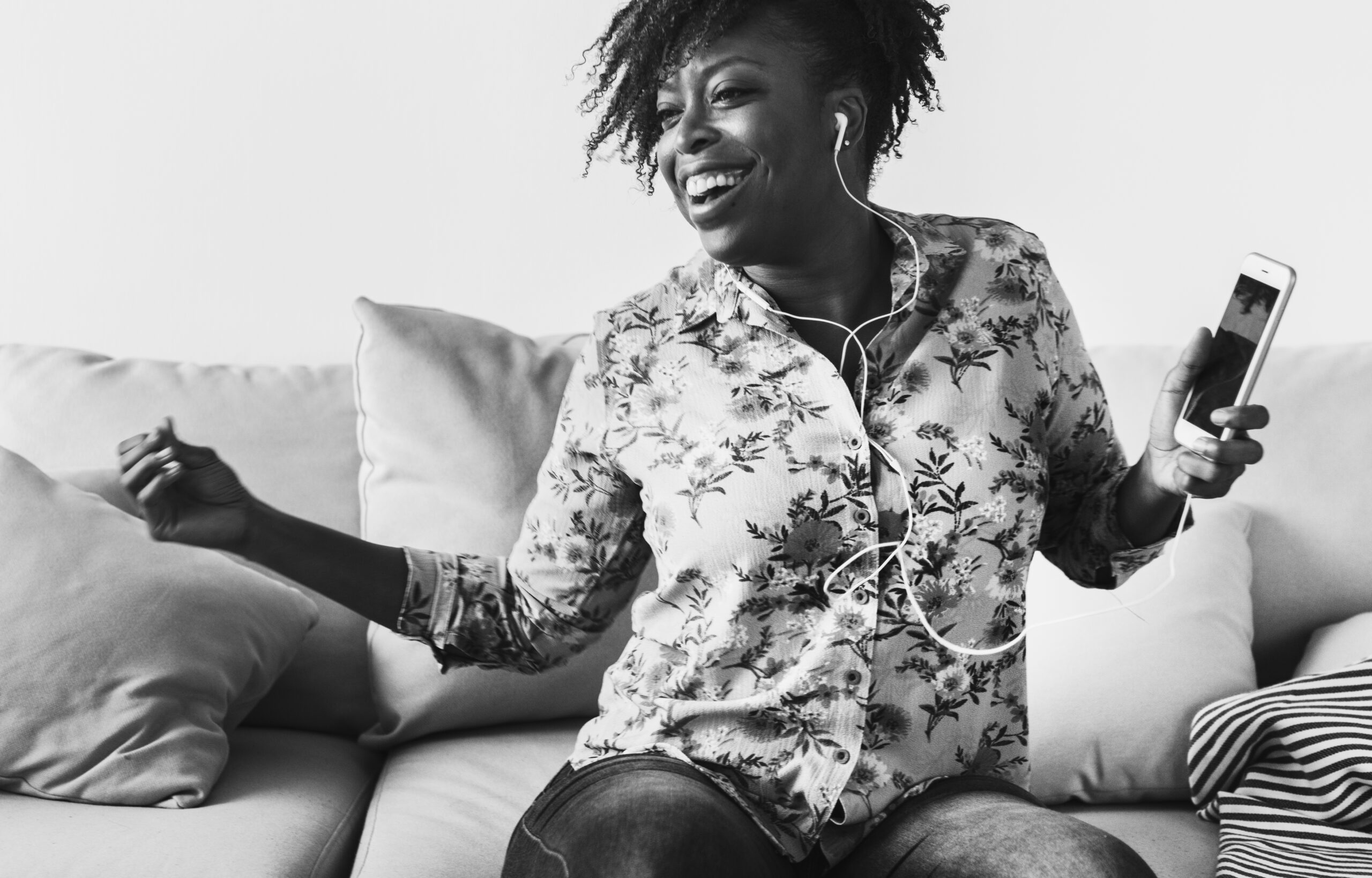 african american woman enjoying music home leisure music concept scaled